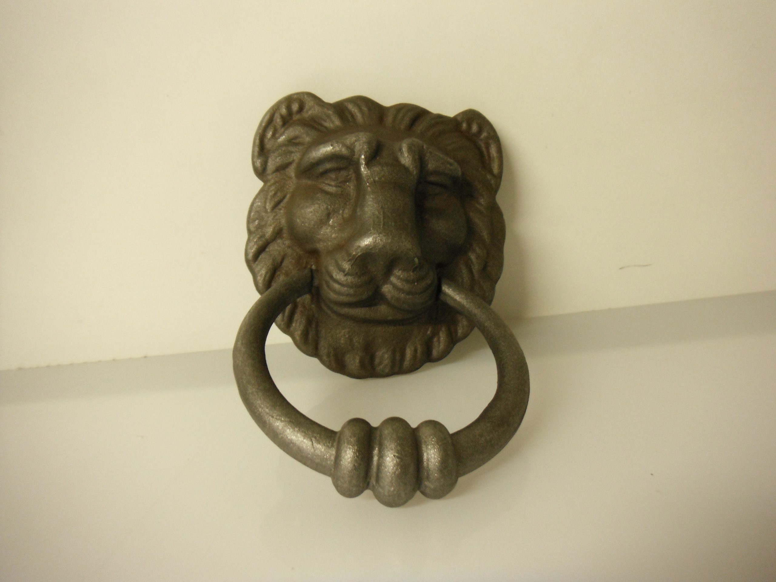 heurtoir de porte fer forgé lion